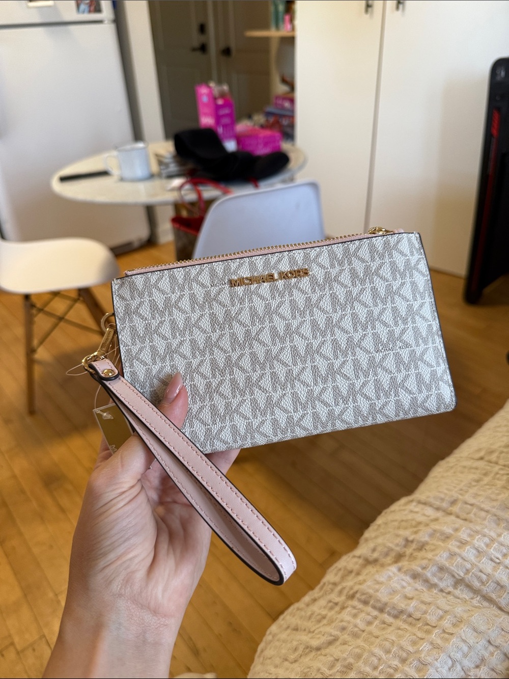 Michael Kors Beige Signature Print Wristlet with Pale Pink Strap
